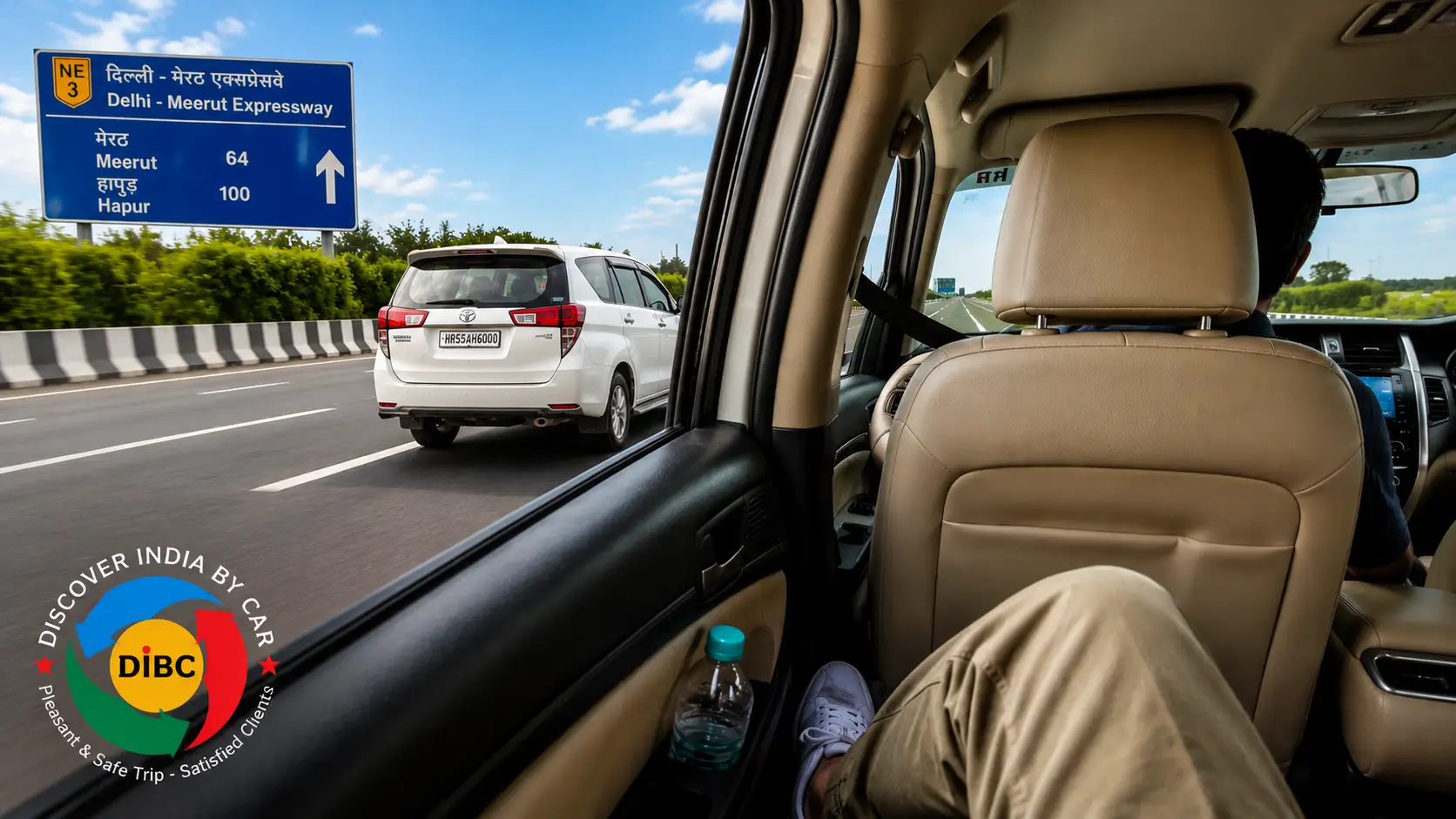 View from inside a comfortable, air-conditioned private car driving on the clean, multi-lane Delhi-Meerut Expressway toward Rishikesh.