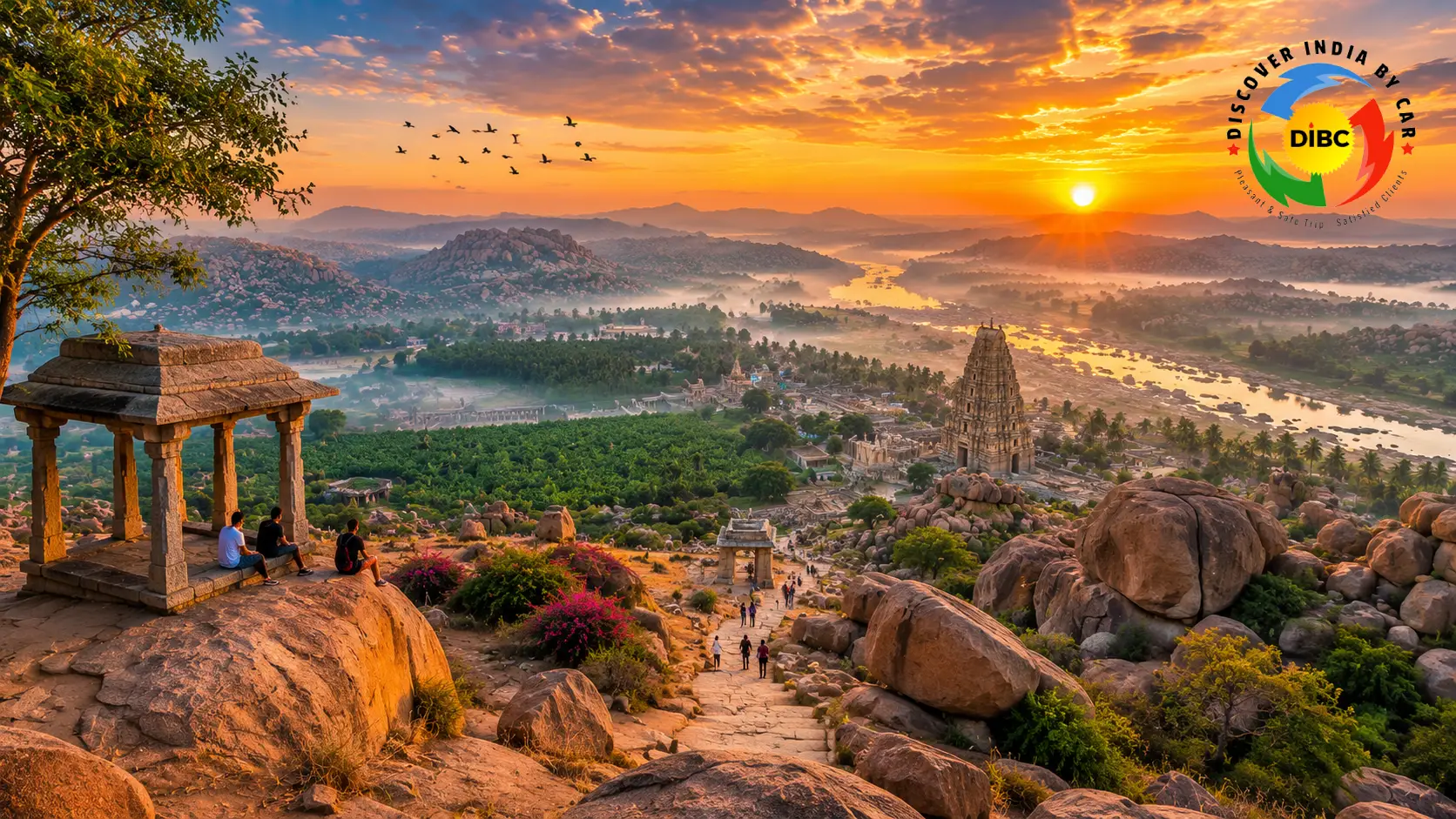 Panoramic landscape view from the summit of Matanga Hill during a vibrant golden sunrise over Hampi ruins and the Tungabhadra river basin.