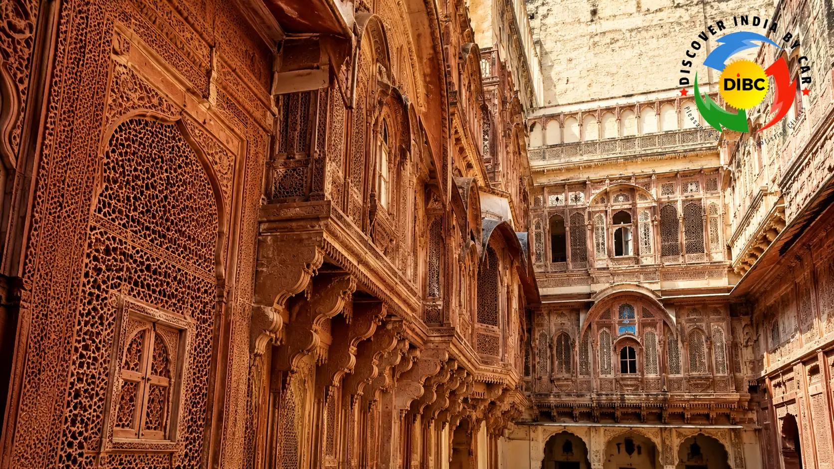 Intricate architectural sandstone carvings and ornate balconies inside the royal courtyards of Mehrangarh Fort museum in Jodhpur