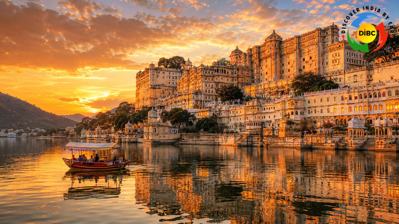 Panoramic view of Udaipur City Palace and Lake Pichola during golden hour sunset